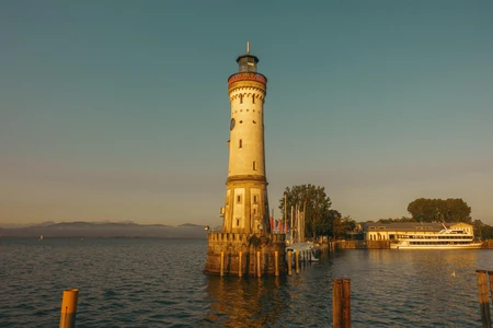 Sunlit Lighthouse by the Lake