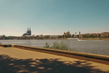 Riverbank View of a Historic Cathedral