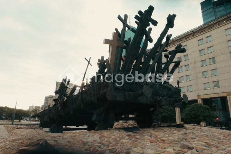 Dramatic Monument Against Urban Backdrop